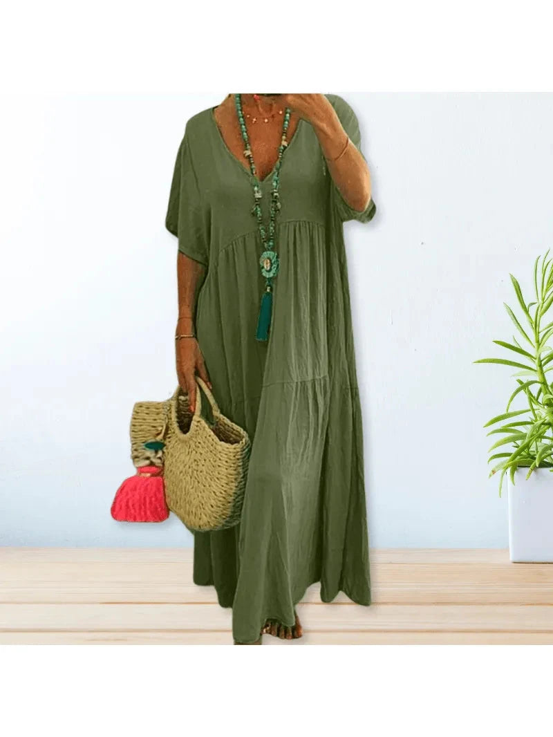 Beige cotton linen BAHAMA dress by Lumina Wear, lightweight and stylish, showing its relaxed fit and natural fabric texture.