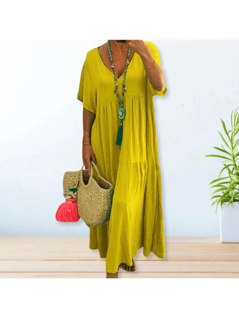 Beige cotton linen dress by Lumina Wear, featuring a relaxed fit and stylish design, perfect for casual summer wear.