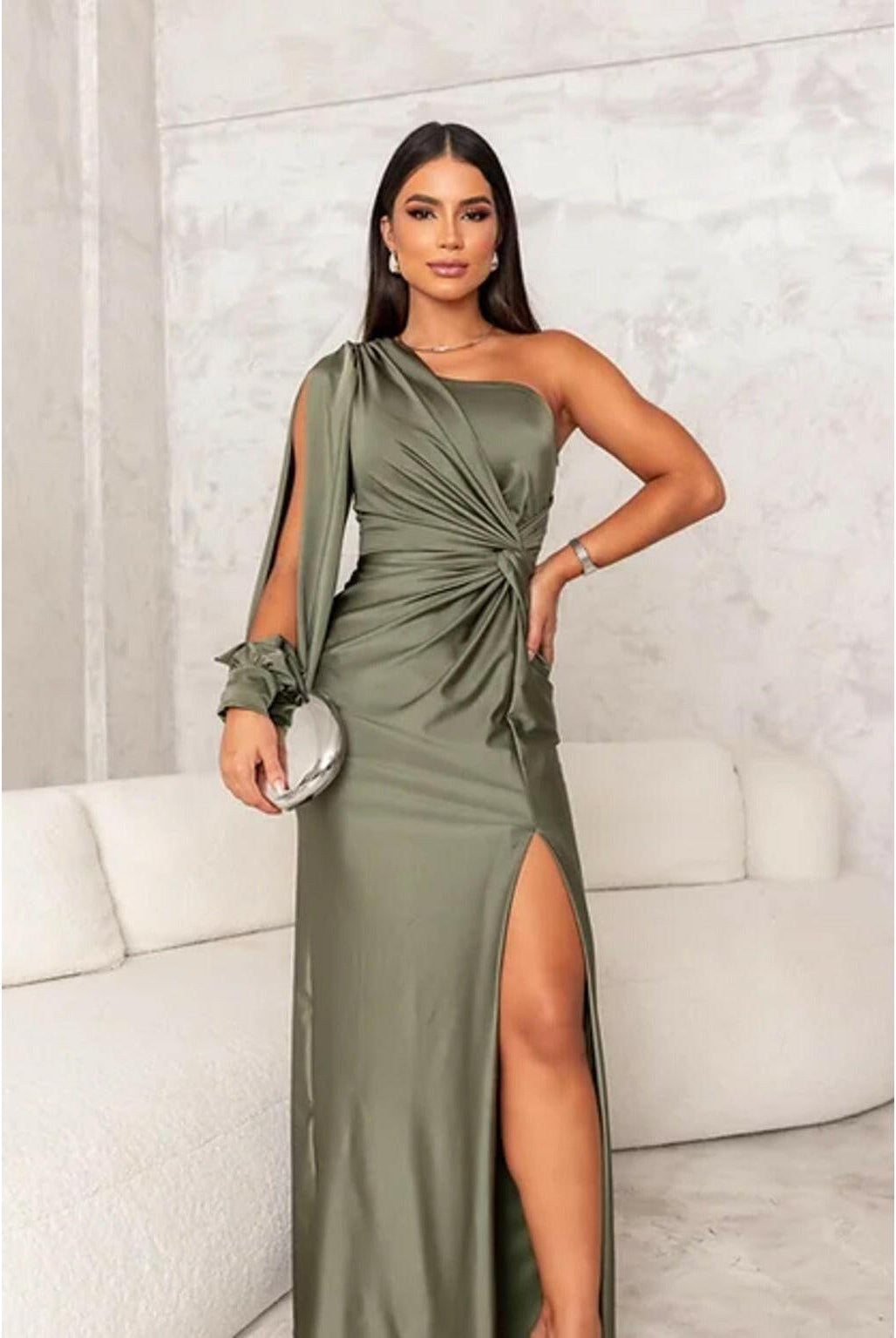 Olive green Becca maxi dress by Lumina Wear featuring elegant satin fabric, worn as a wedding guest outfit.