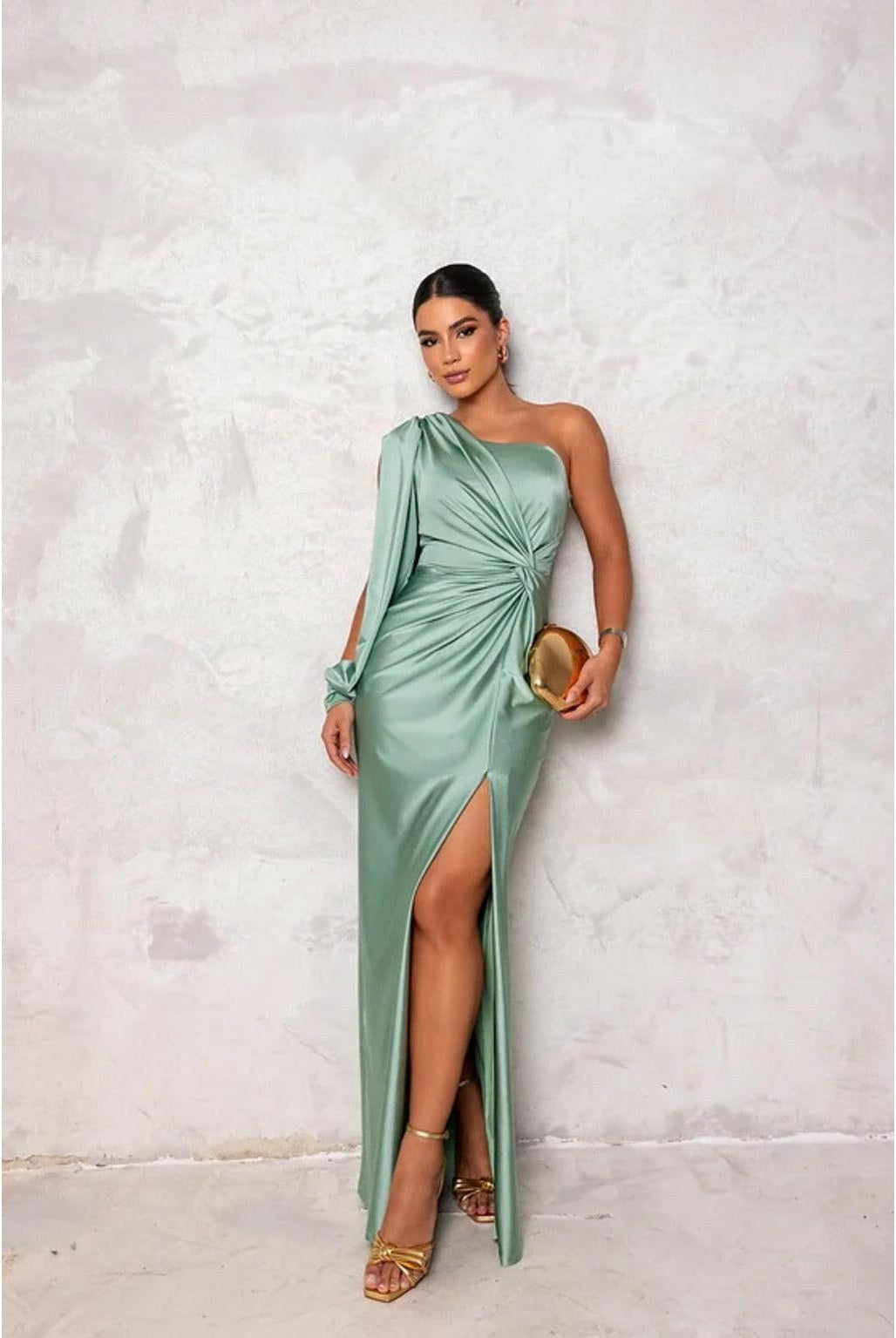 Olive green Becca satin maxi dress by Lumina Wear, elegant floor-length gown perfect for wedding guests, shown on a model.