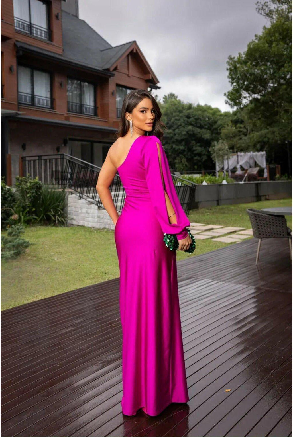 Olive green Becca Lumina Wear elegant satin maxi dress, flowing fabric, suitable for wedding guest or formal occasions.