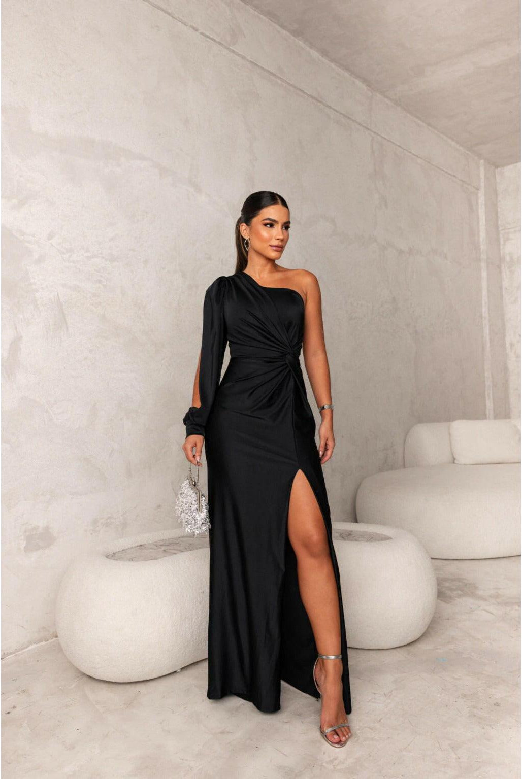 Olive green Becca Lumina Wear elegant satin maxi dress, sleeveless with flowing fabric, perfect for wedding guests.