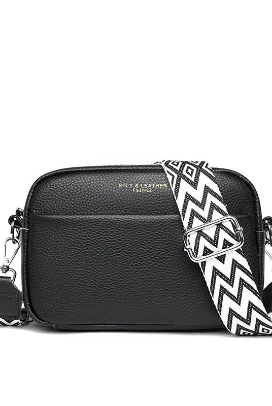Lumina Wear Bella chic compact black leather shoulder bag with sleek design and adjustable strap, perfect for everyday use.