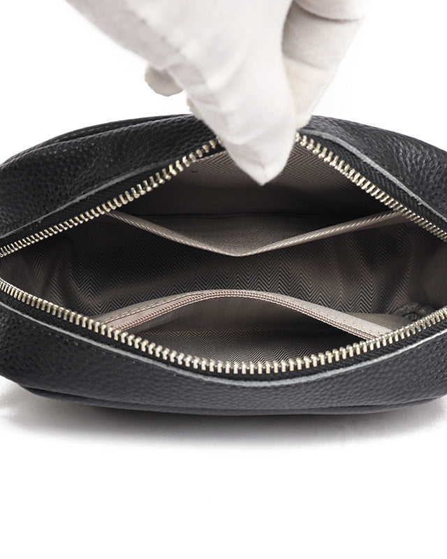 Lumina Wear Bella chic compact black leather shoulder handbag with sleek design and silver hardware.