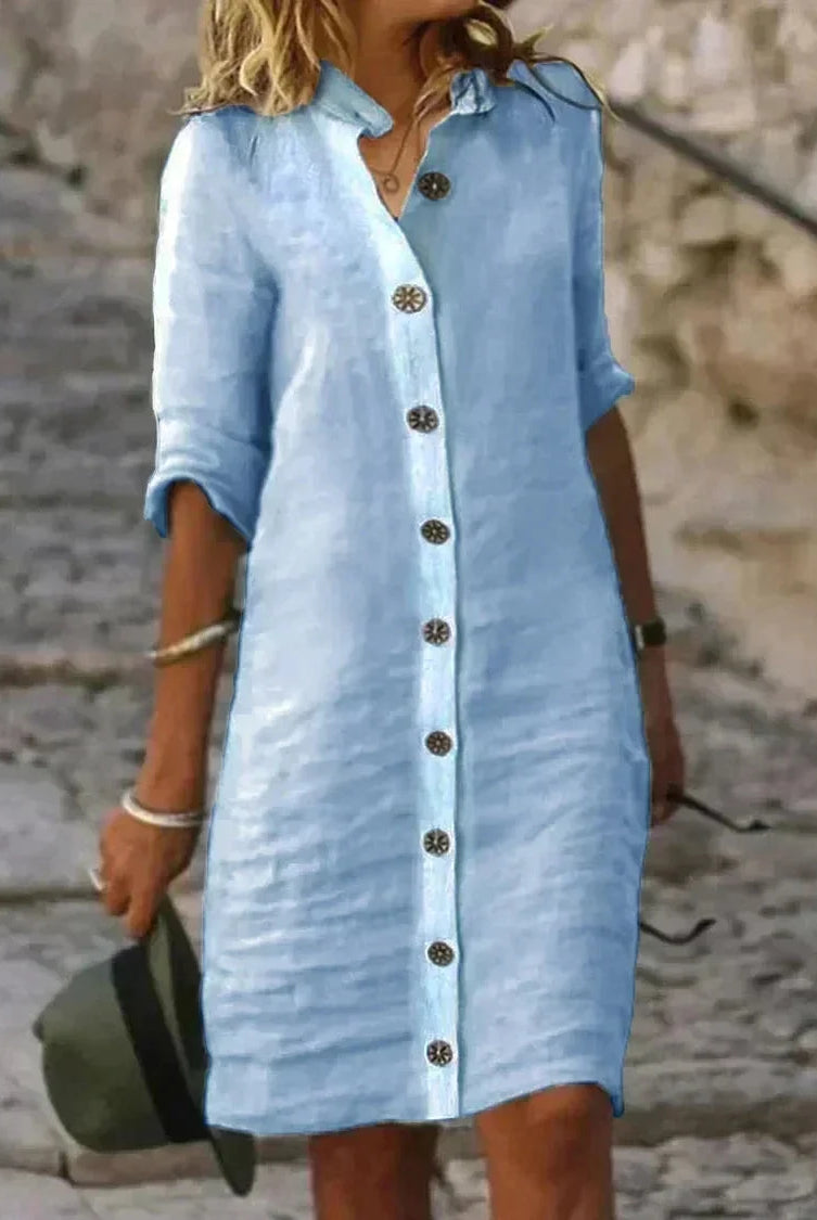 White Bellatrix shirt dress by Lumina Wear, button-down mini dress with a tailored fit and classic collar, styled on a model.
