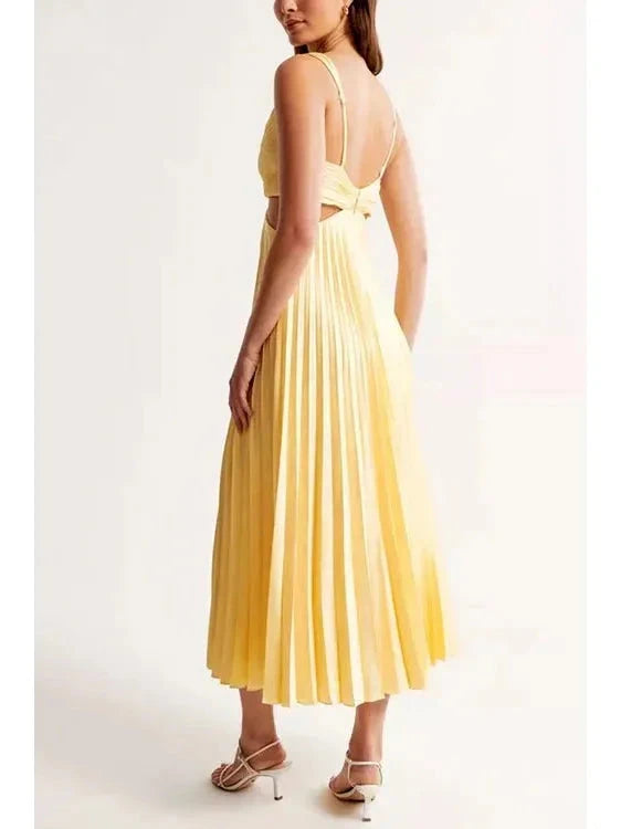 Yellow Bianca elegant chic dress by Lumina Vancouver, showcasing a stylish, flowing design perfect for sophisticated occasions.