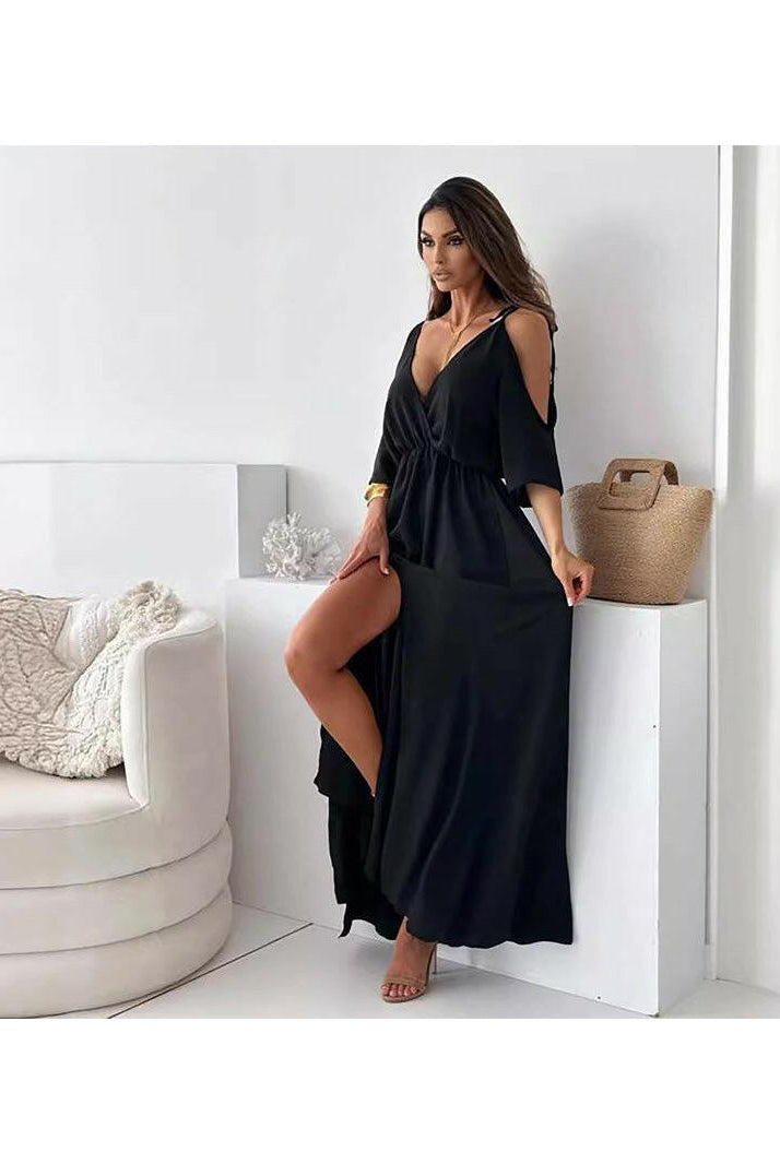 Red Billie V-Neck Maxi Dress with trendy slit skirt, by Lumina Vancouver, displayed on a hanger.