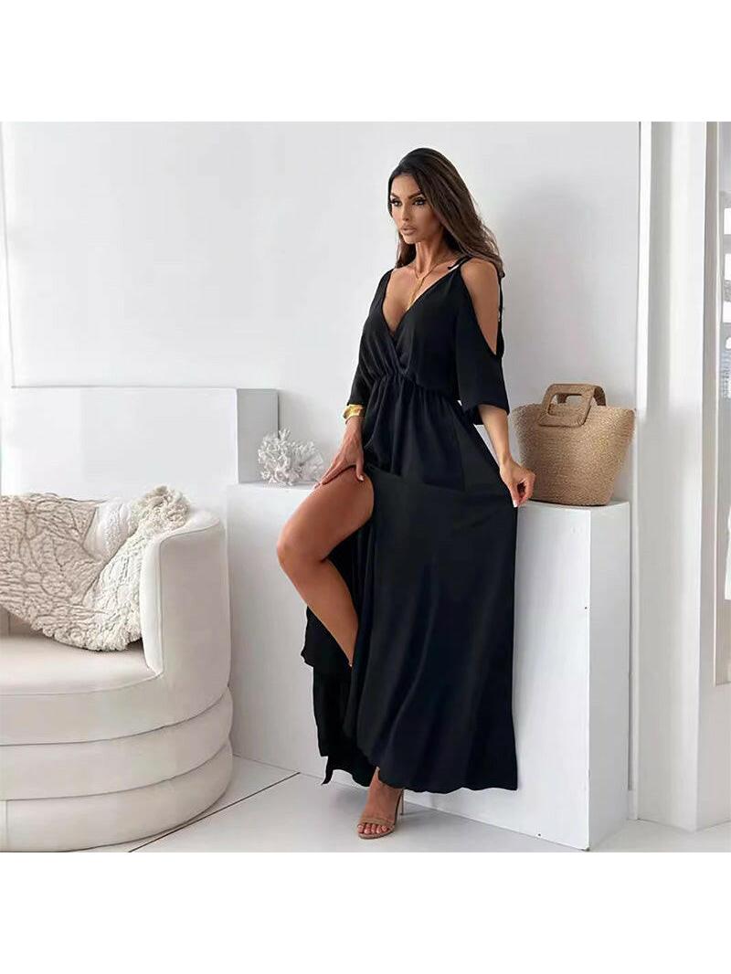 Red Billie V-Neck Maxi Dress with trendy slit skirt, by Lumina Vancouver, displayed on a hanger.
