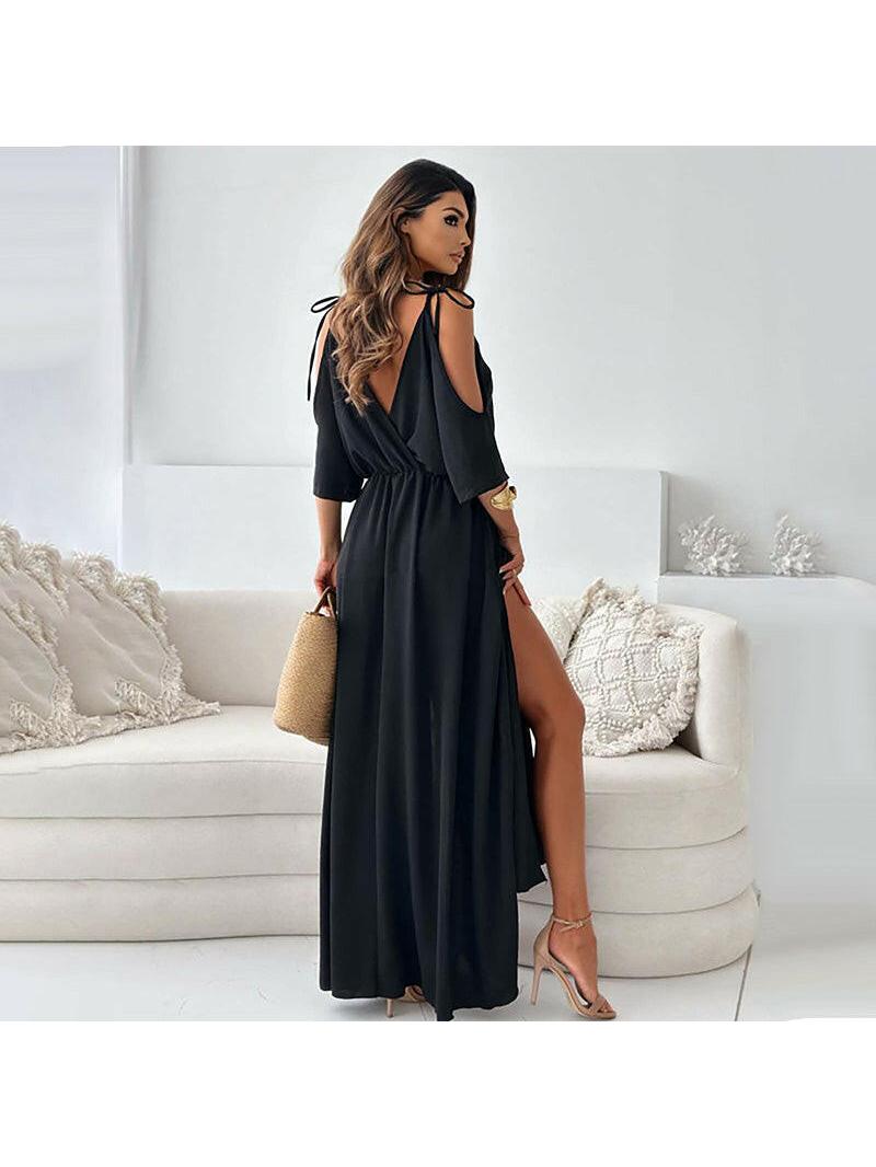 Red Billie V-neck maxi dress with trendy slit skirt by Lumina Vancouver, shown on a model. Elegant and stylish for special occasions.