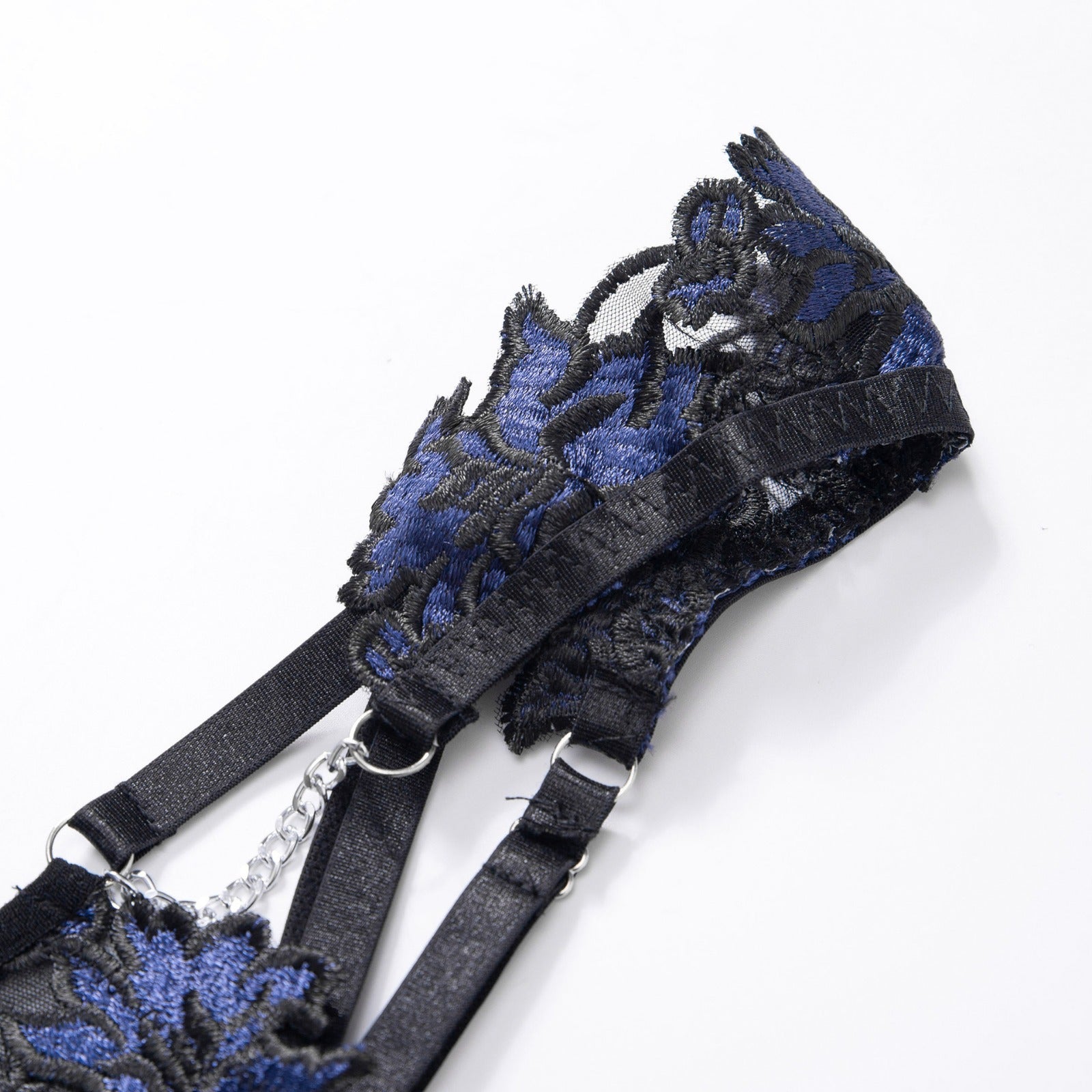 Black and blue floral embroidery ribbon lingerie set by Lumina Vancouver, includes two-piece set featuring delicate embroidery and satin ribbons.