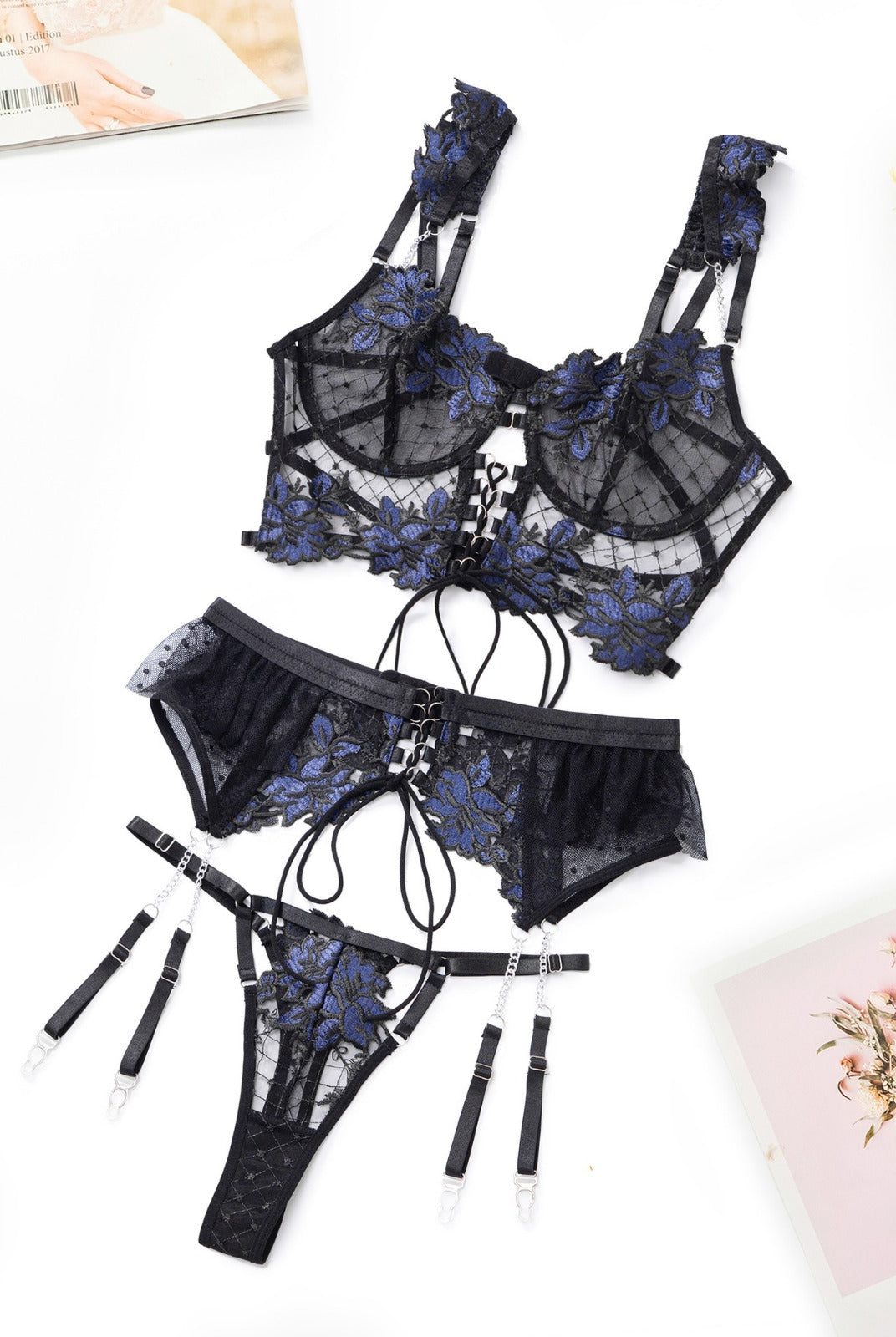 Black and blue floral embroidery ribbon lingerie set, two-piece set by Lumina Vancouver, featuring delicate lace and decorative floral details.