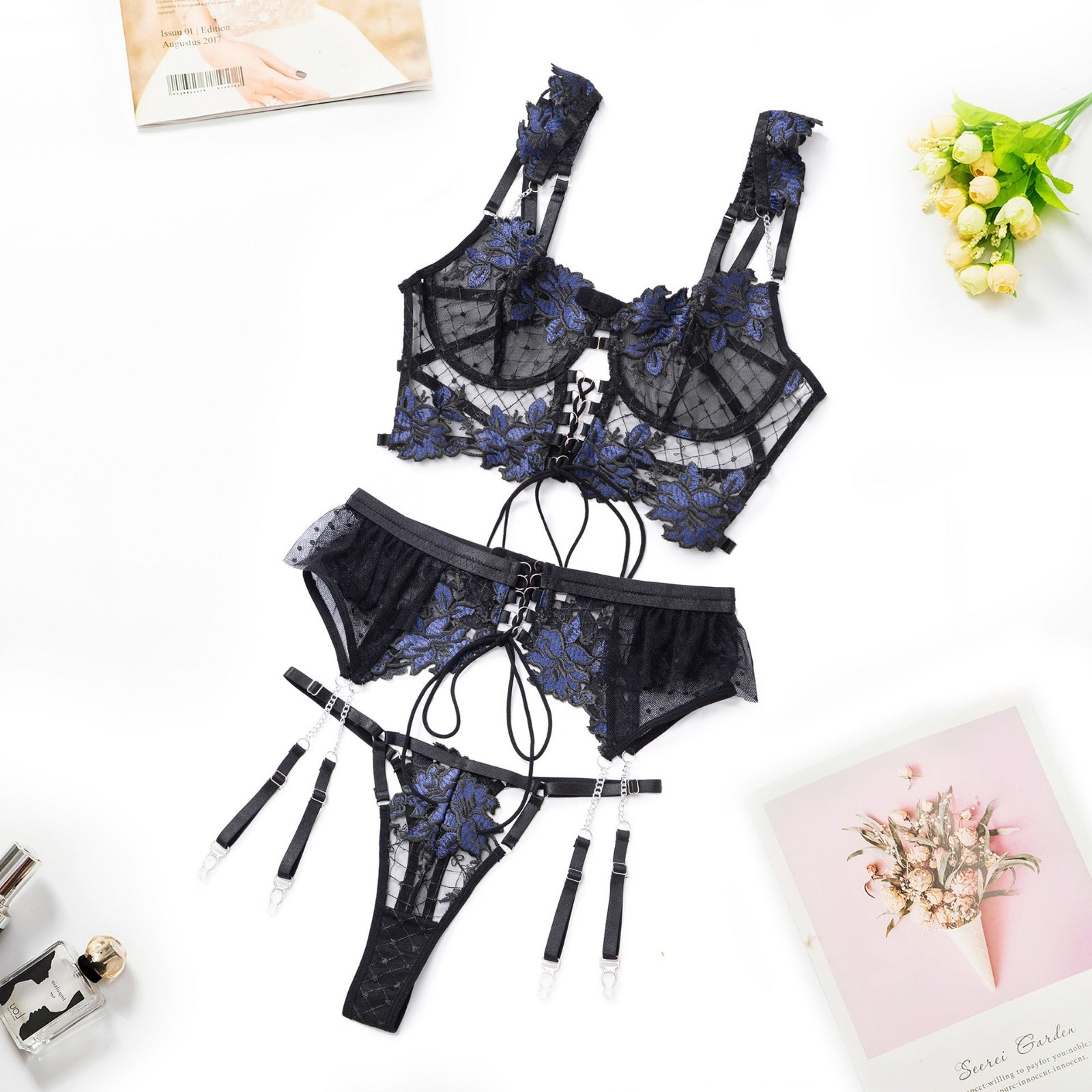 Black and blue floral embroidery ribbon lingerie set, two-piece set by Lumina Vancouver, featuring delicate lace and decorative floral details.