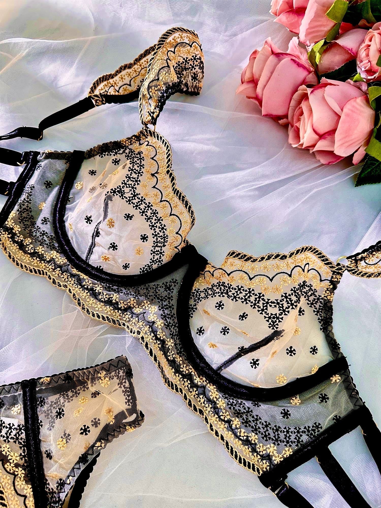 Black and gold luxury lace embroidered lingerie set by Lumina Vancouver, three-piece sexy intimates with intricate detailing.
