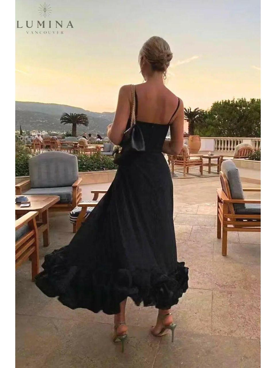 Black Blair Lumina Wear flowing wedding guest dress, elegant and graceful, suitable for formal occasions and parties.