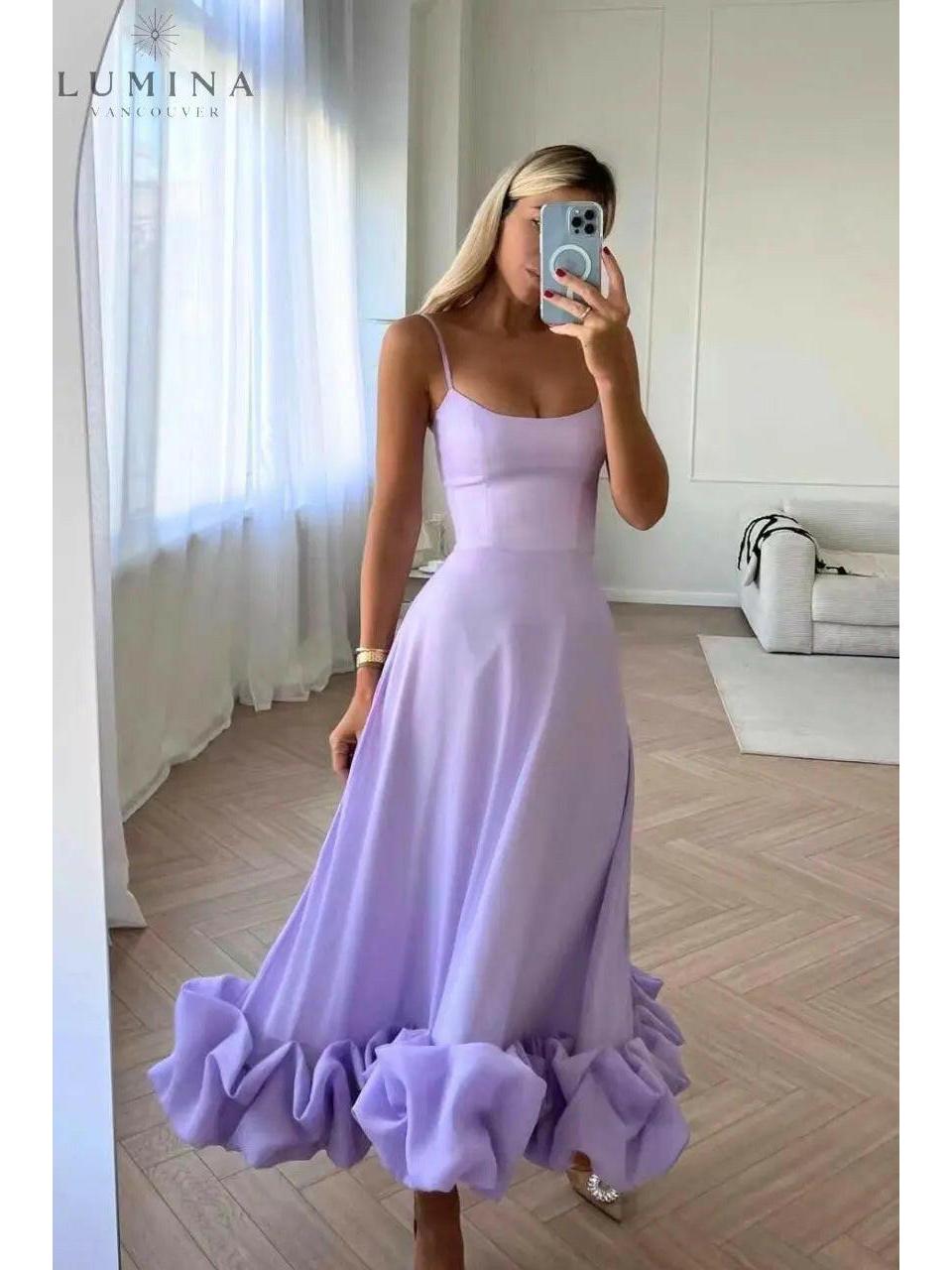 Black Blair Graceful Flowing Dress for wedding guests by Lumina Wear, featuring elegant, flowing fabric and a stylish design.