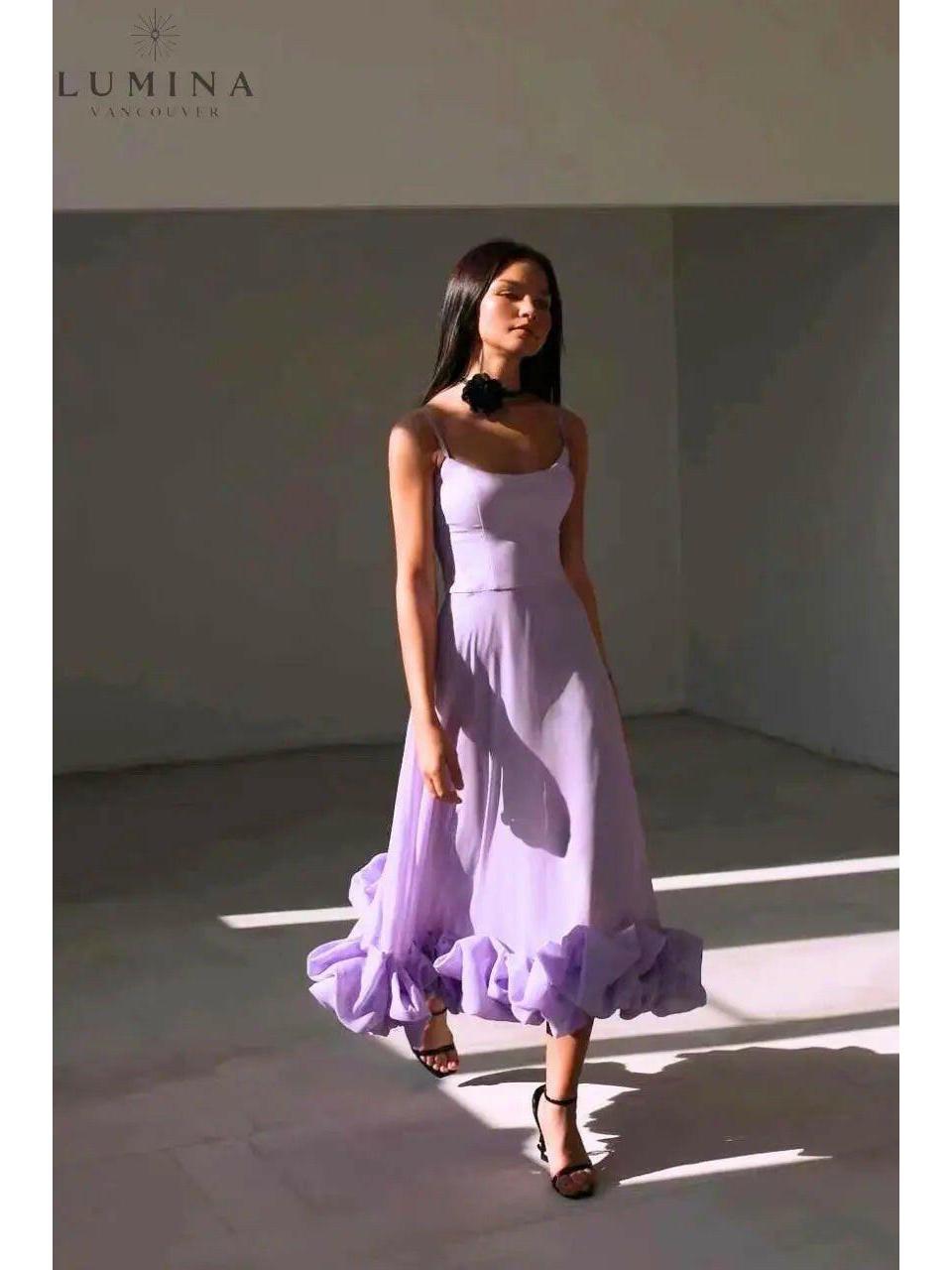 Black Blair Lumina Wear wedding guest dress with flowing fabric, perfect for elegant occasions and formal events.