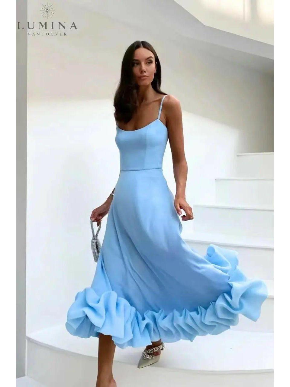 Black Blair wedding guest dress by Lumina Wear featuring a graceful flowing silhouette, perfect for formal occasions.
