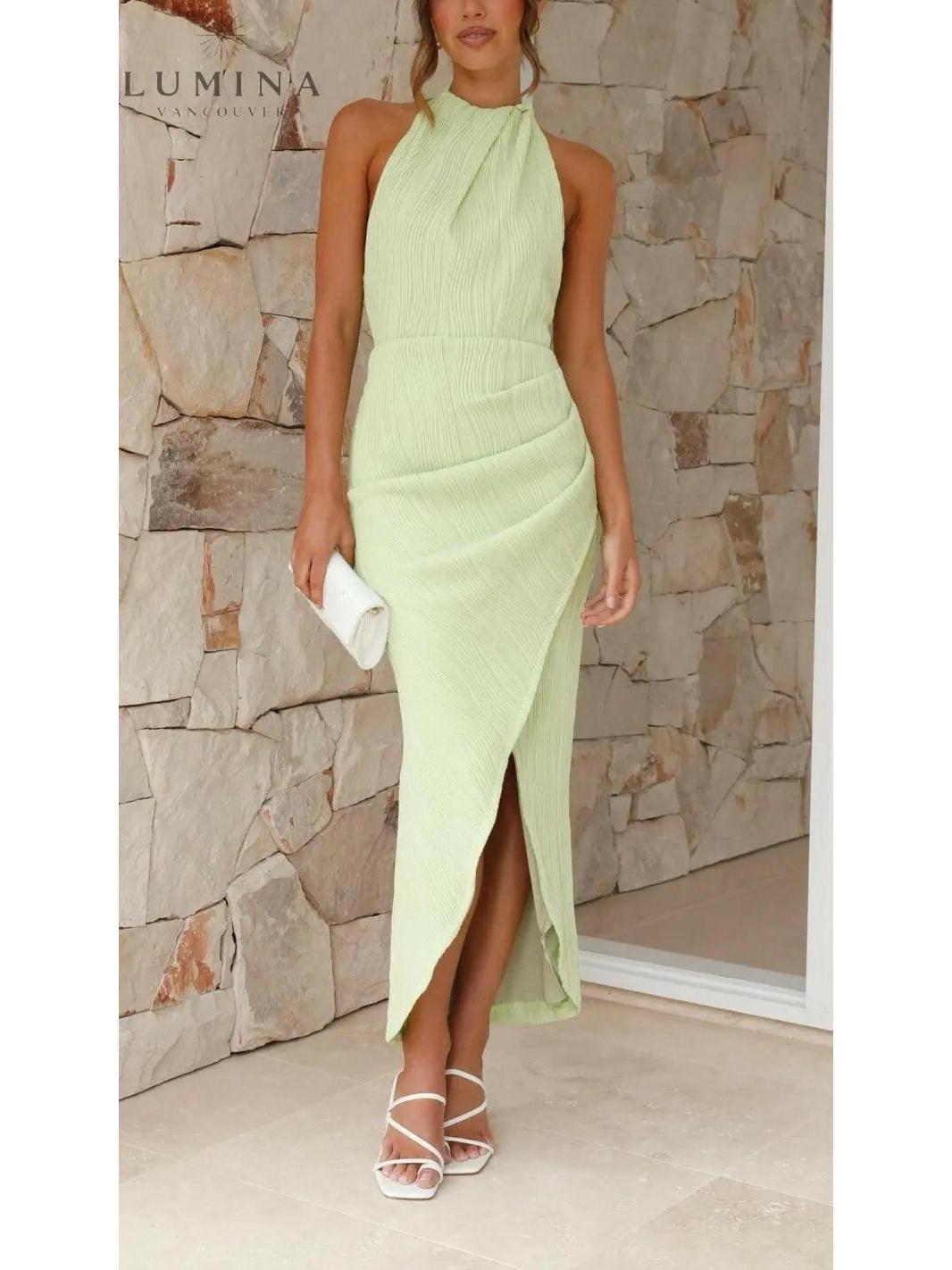 Light green Blaire Elegant Pleated Maxi Dress by Lumina Vancouver, showcasing flowing fabric and sophisticated design.