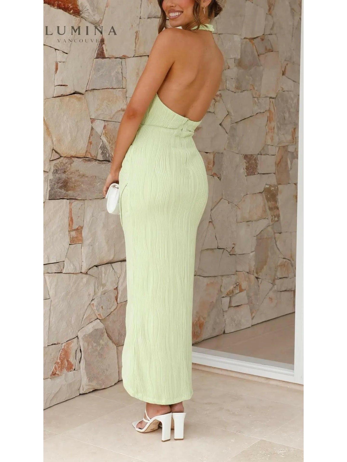 Light green Blaire elegant pleated maxi dress by Lumina Vancouver, featuring flowing fabric and sophisticated style.