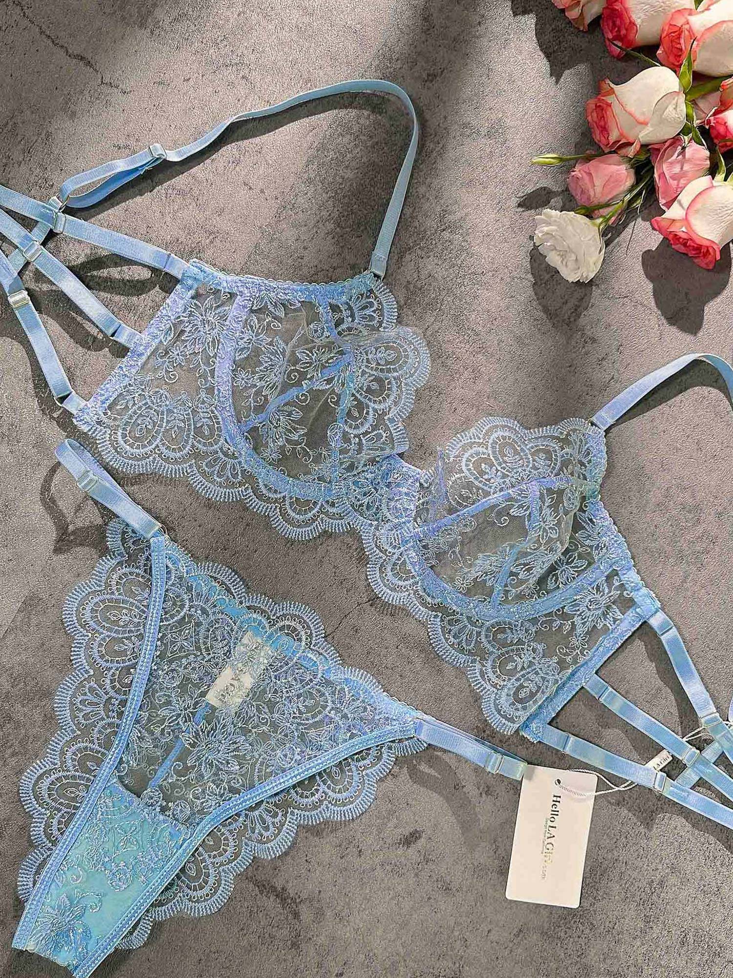 Blue Exquisite Lace Lingerie Set by Lumina Vancouver, a 2-piece blue lace bra and matching panties on a model.