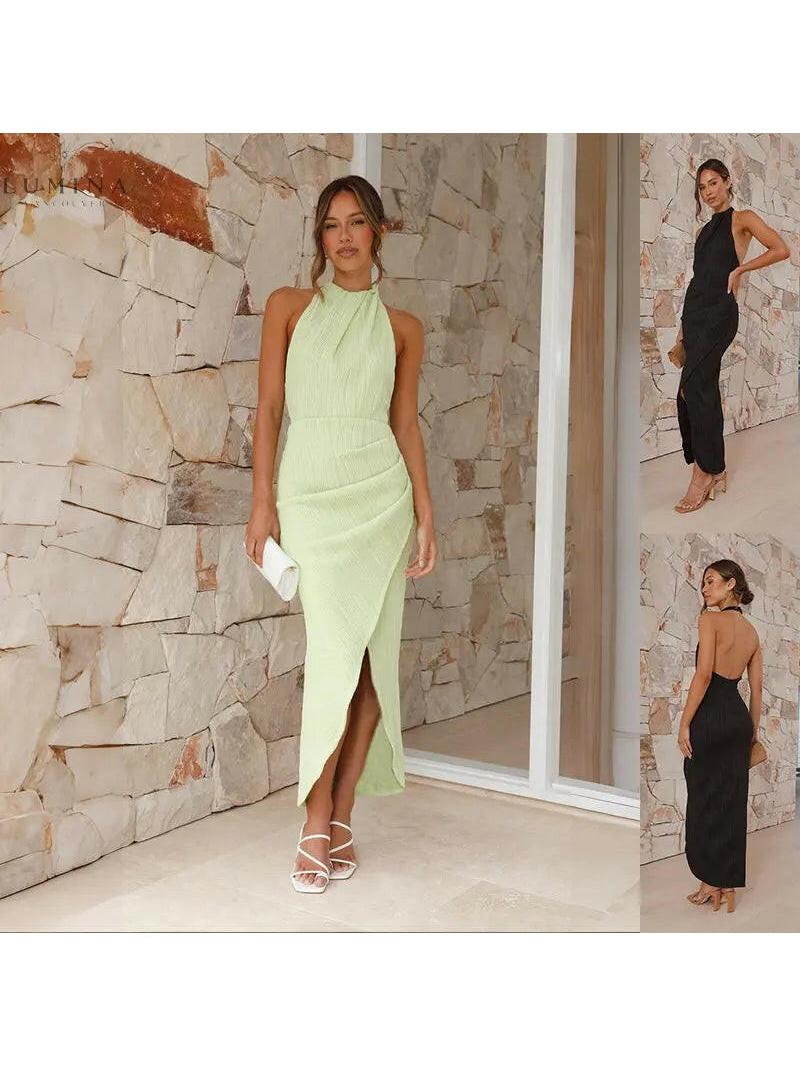 Green Brianna backless wedding guest dress by Lumina Vancouver, elegant sleeveless design with a flowing silhouette.