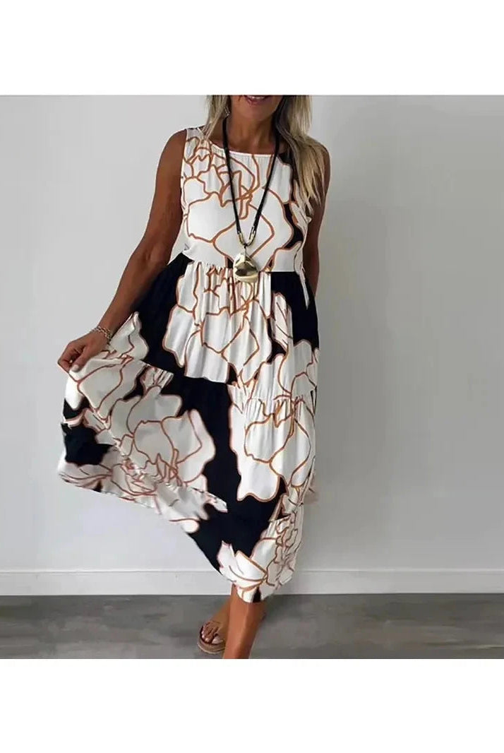 Brown Caitlyn™ sleeveless maxi dress by Lumina Vancouver, flowing design, lightweight fabric, perfect for summer or casual occasions.