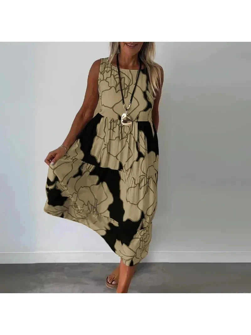 Brown CAITLYN™ sleeveless maxi dress by Lumina Vancouver, flowing design with a fitted waist and elegant silhouette.