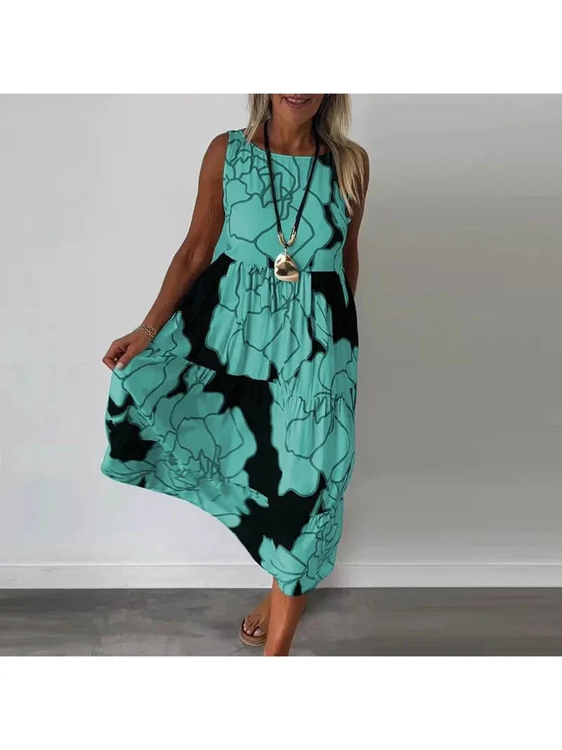 Brown Caitlyn™ sleeveless maxi dress by Lumina Vancouver, flowing design with a fitted waist and elegant style.