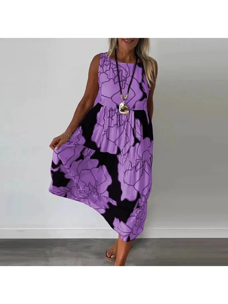 Brown Caitlyn™ sleeveless maxi dress by Lumina Vancouver, flowing fabric and elegant design for casual or formal occasions.