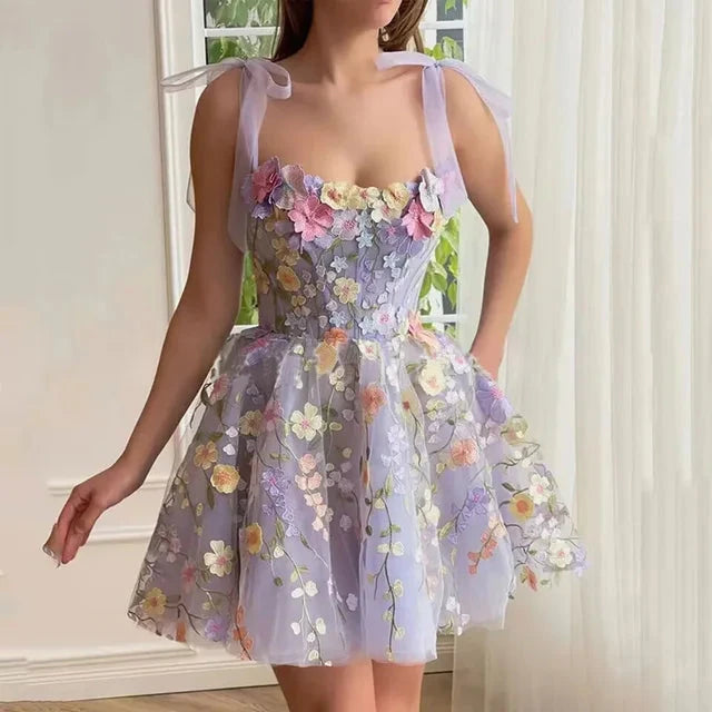 Light purple sleeveless embroidered mini dress by Lumina Vancouver, featuring intricate embroidery and a fitted silhouette.