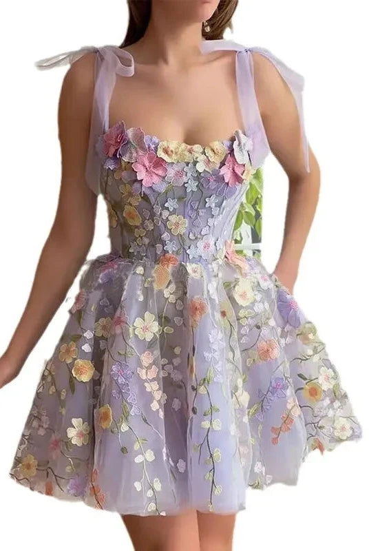 Light purple Calista sleeveless embroidered mini dress by Lumina Wear displayed on a hanger with intricate embroidery details.