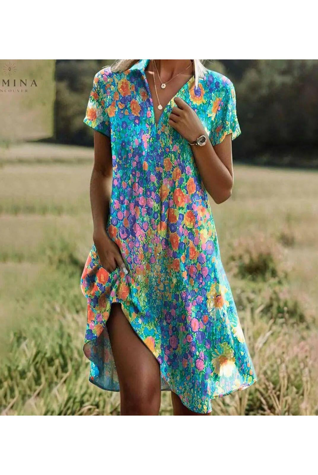 Lumina Wear Callie Spring Dress with colorful floral pattern, lightweight fabric, and feminine fit, perfect for warm weather.