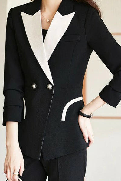 Black Camille monochrome tailored pant suit set by Lumina Vancouver, featuring a sleek, fitted design and modern styling.