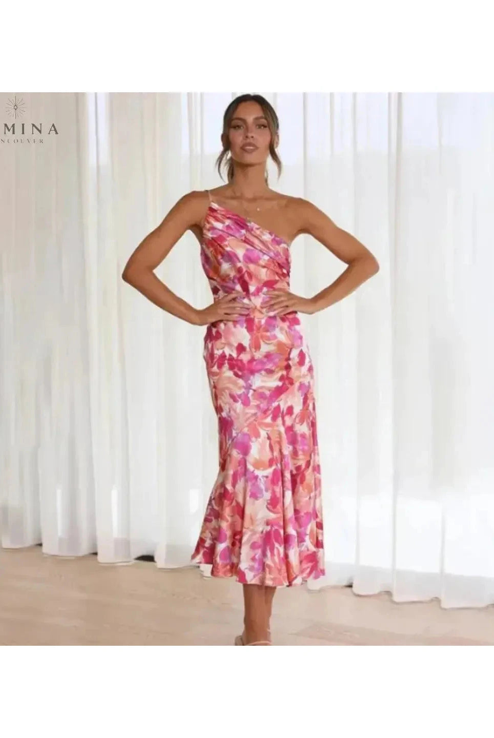Cassandra summer elegant wedding guest dress by Lumina Vancouver, sleeveless style with flowing fabric and floral pattern.