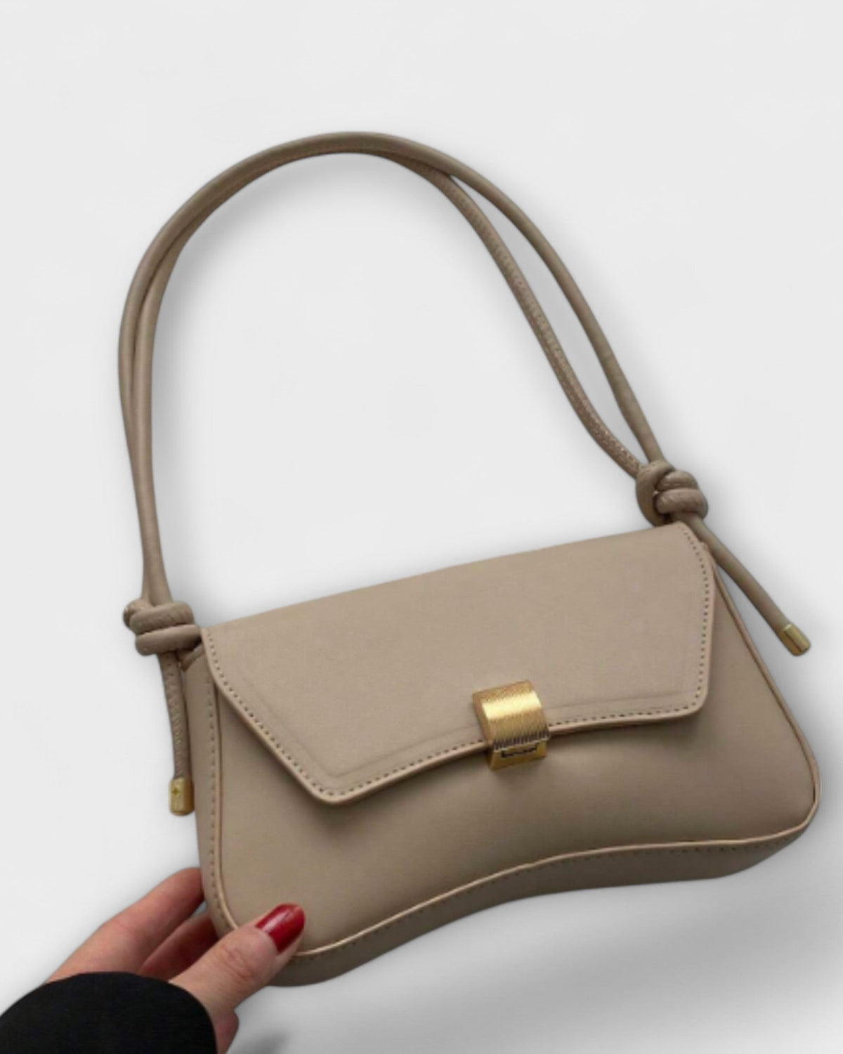 Lumina Wear Cécile sleek mini shoulder bag in terracotta with elegant design, featuring a compact silhouette and stylish details.