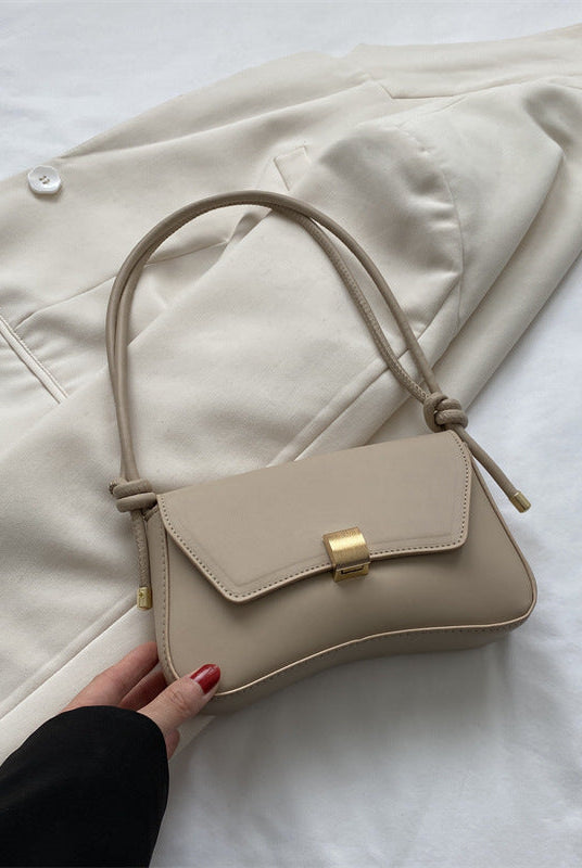 Lumina Wear Cécile sleek mini shoulder bag in terracotta with elegant design, featuring a compact silhouette and stylish details.