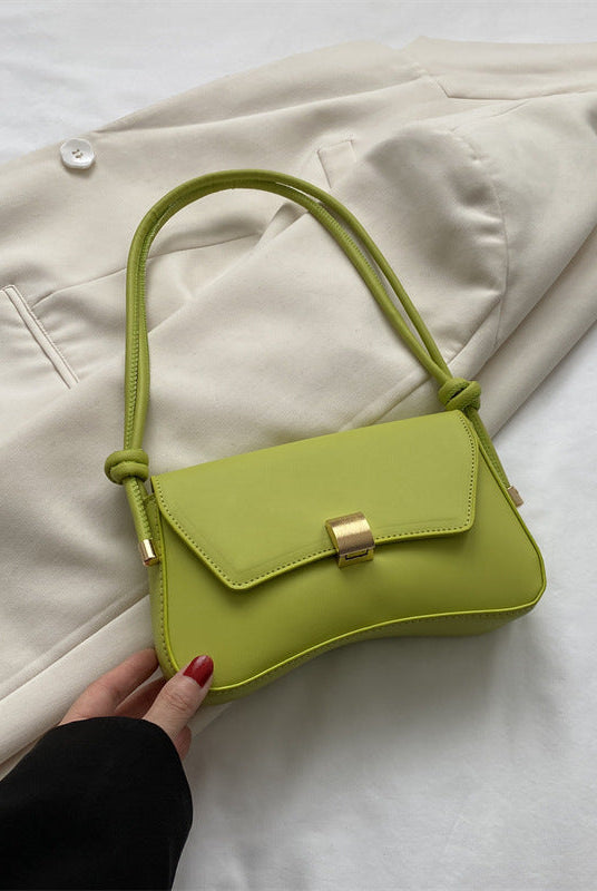 Lumina Wear Cécile mini shoulder bag in terracotta with sleek, elegant design, perfect for stylish daily use.