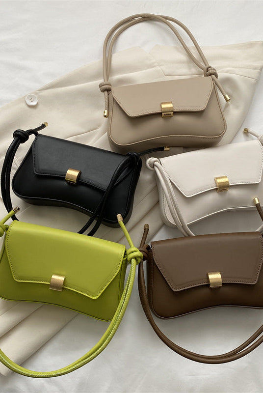 Lumina Wear Cécile mini shoulder handbag in terracotta with a sleek, elegant design, perfect for stylish everyday use.