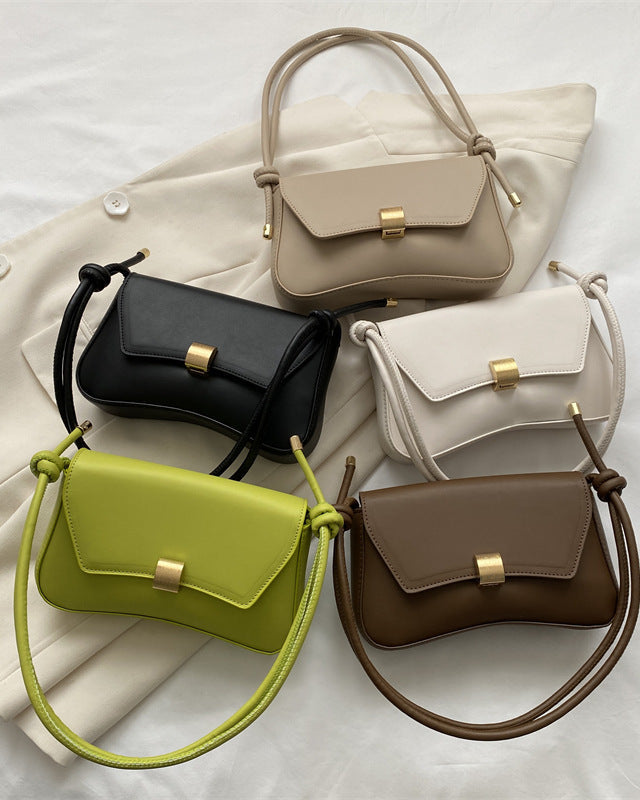 Lumina Wear Cécile mini shoulder handbag in terracotta with sleek, elegant design, featuring a compact and stylish silhouette.