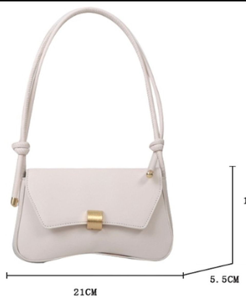 Lumina Wear Cécile sleek mini shoulder bag with elegant terracotta design, featuring a compact, stylish handbag with a modern look.