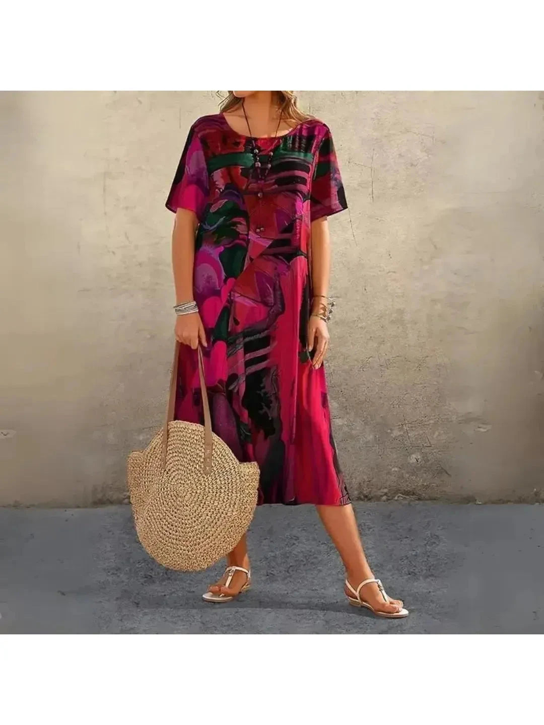 Elegant multi-color floral dress by Lumina Vancouver, featuring a flowing design and vibrant blue and green floral patterns.