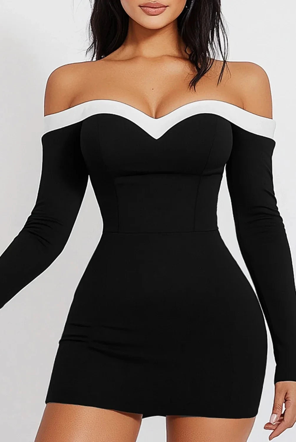 Black Celeste Moonstone bodycon mini dress by Lumina Vancouver featuring a sleek fit and elegant design.