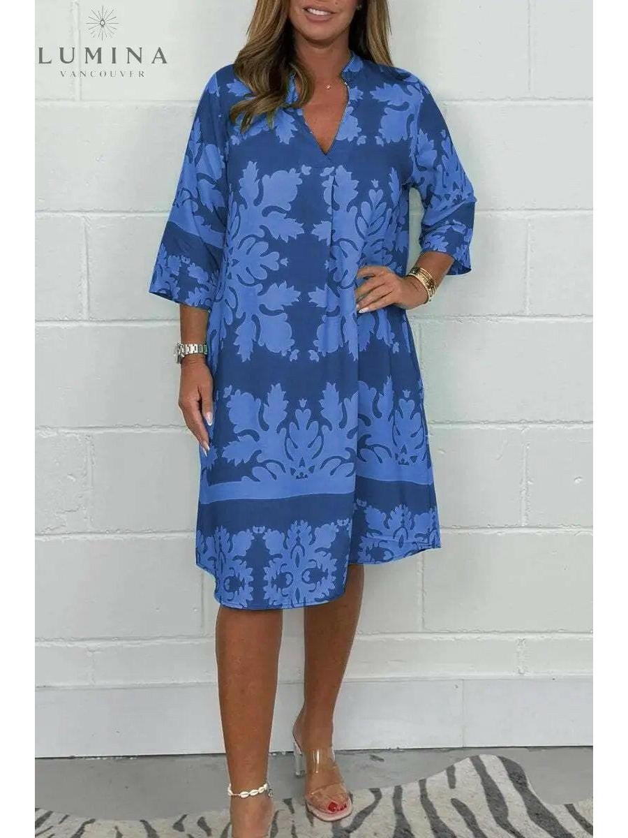 Blue and army green Bergljot spring dress by Lumina Vancouver, featuring a floral pattern and lightweight fabric.