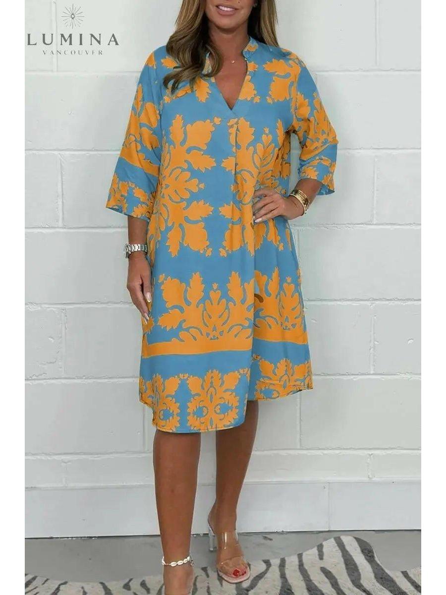 Bergljot spring dress by Lumina Vancouver in blue and army green, featuring a flowy design and lightweight fabric.
