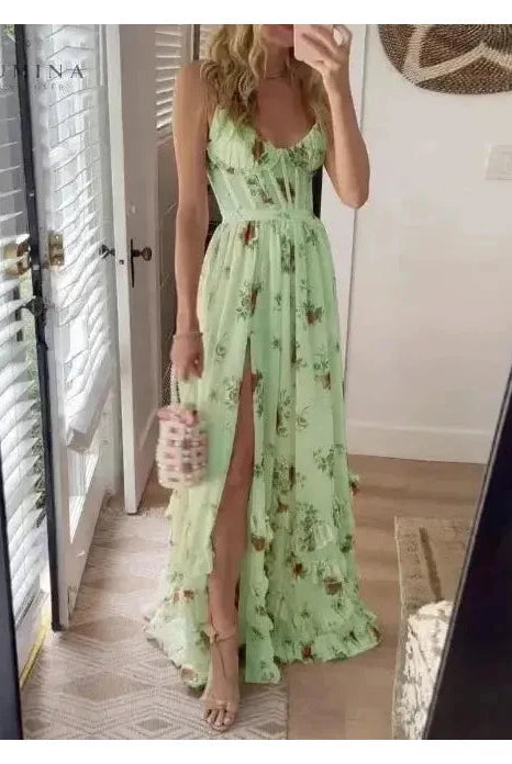 Green Lumi Radiant Elegance Evening Dress by Lumina Wear, featuring a flowing design perfect for wedding guests.