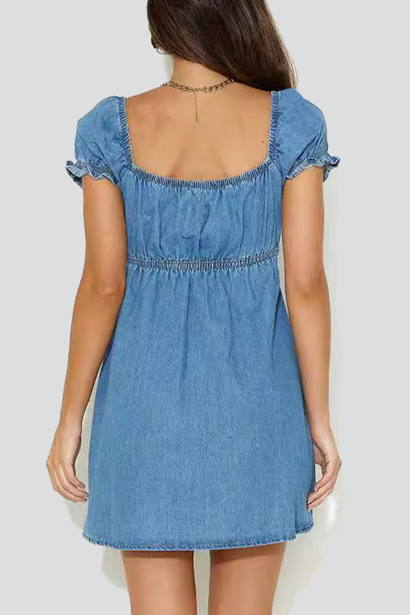 Celestine Moonshadow denim mini dress by Lumina Vancouver, shown in blue with a fitted silhouette and casual style.