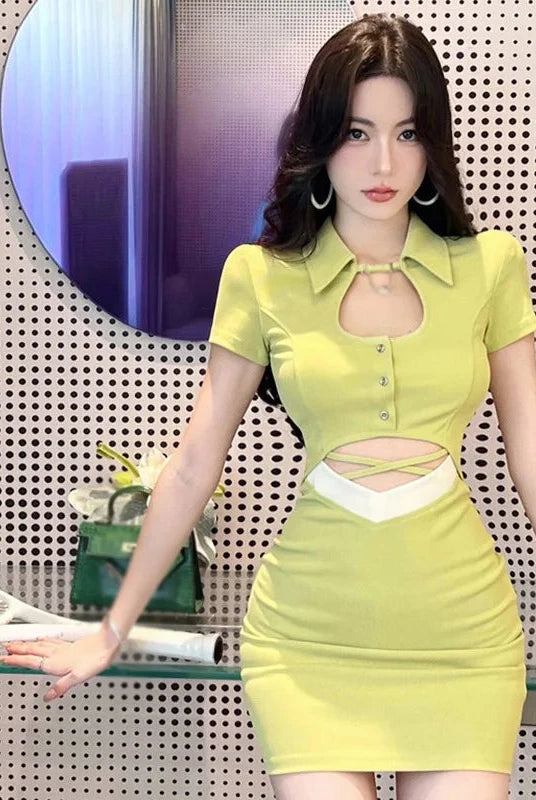 Green Celestoria slim fit mini dress by Lumina Vancouver, showcasing a stylish, fitted silhouette with elegant design details.