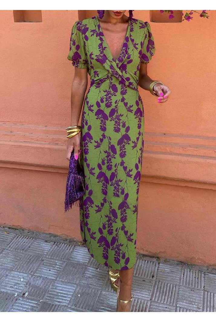 Lumina Wear Celia elegant floral dress with a fitted bodice and flowing skirt, perfect for summer occasions.