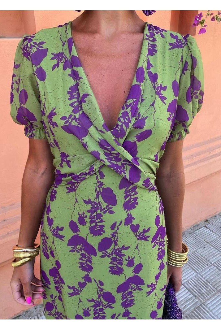 Lumina Wear Celia elegant floral dress with a fitted bodice and flowing skirt, perfect for summer occasions.