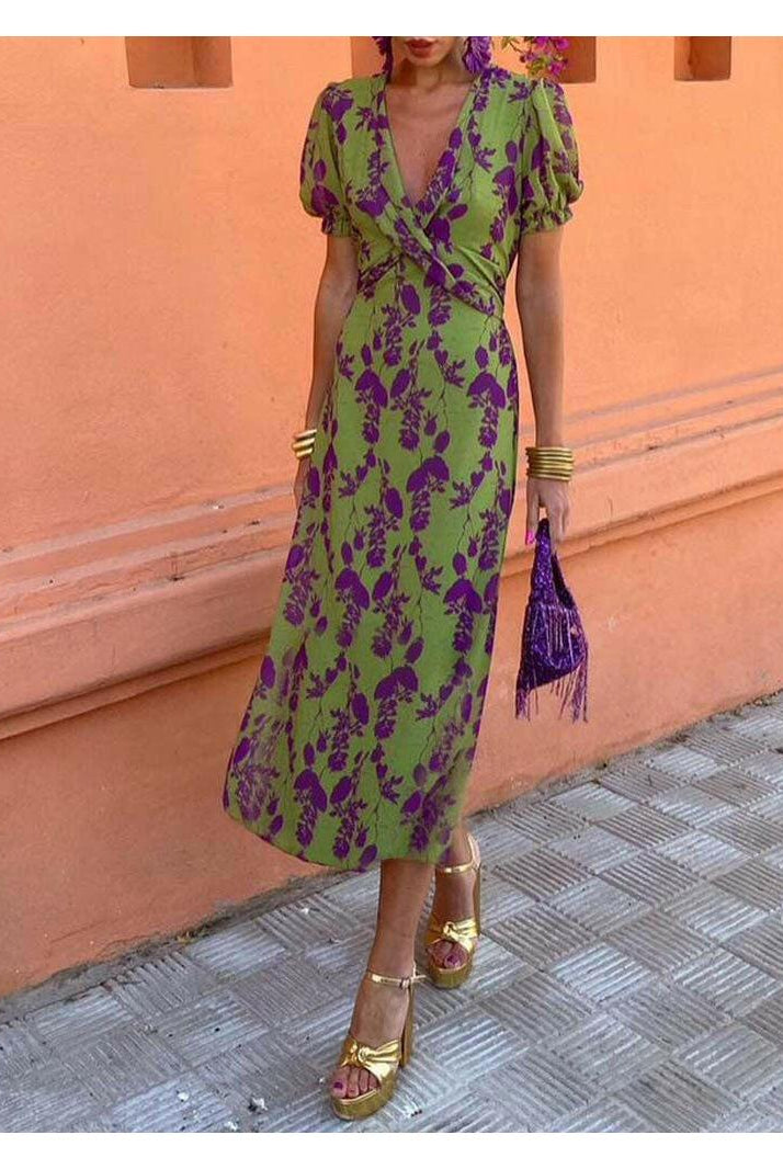 Lumina Wear Celia elegant floral dress with a fitted bodice and flowing skirt, perfect for spring and summer occasions.